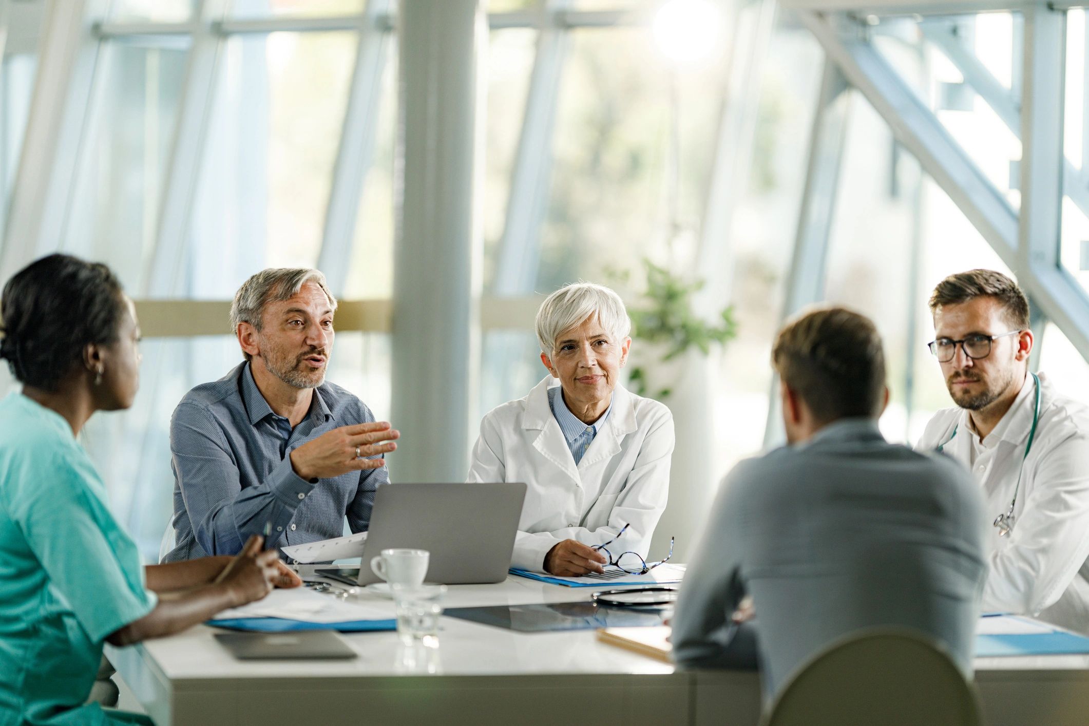 Medical team meeting to coordinate patient care